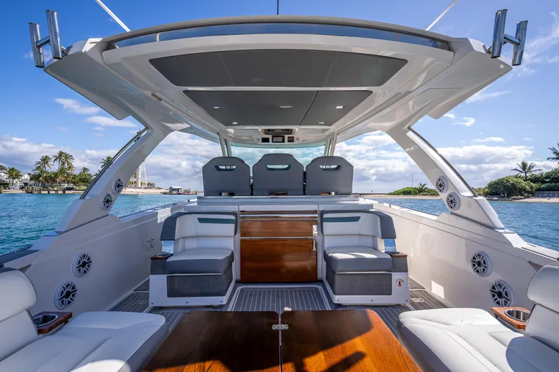  Yacht Photos Pics 2019 Tiara Sport 38 LS luxury yacht interior with seating, ocean view, and clear skies.