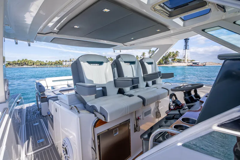  Yacht Photos Pics 2019 Tiara Sport 38 LS yacht interior with luxurious seating and ocean view.
