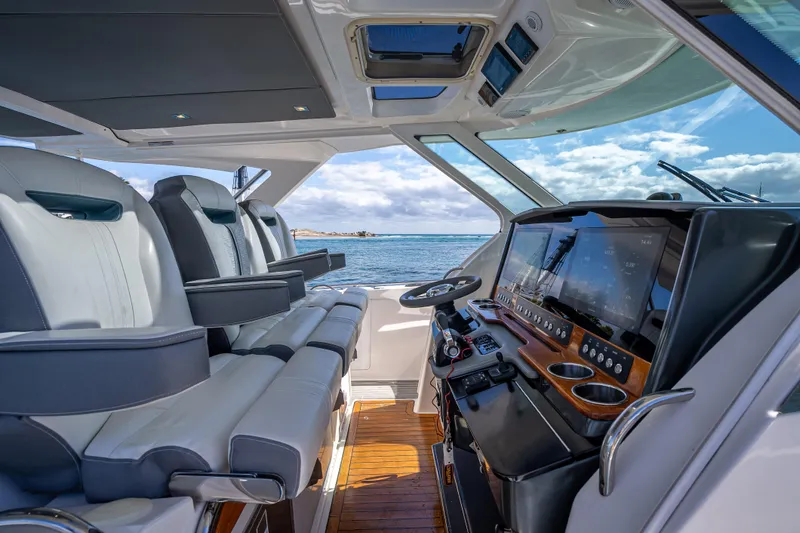  Yacht Photos Pics Interior of 2019 Tiara Sport 38 LS yacht with luxurious seating and advanced navigation system.