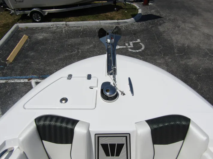  Yacht Photos Pics 2024 Wellcraft 243 Fisherman boat bow with anchor and seating.