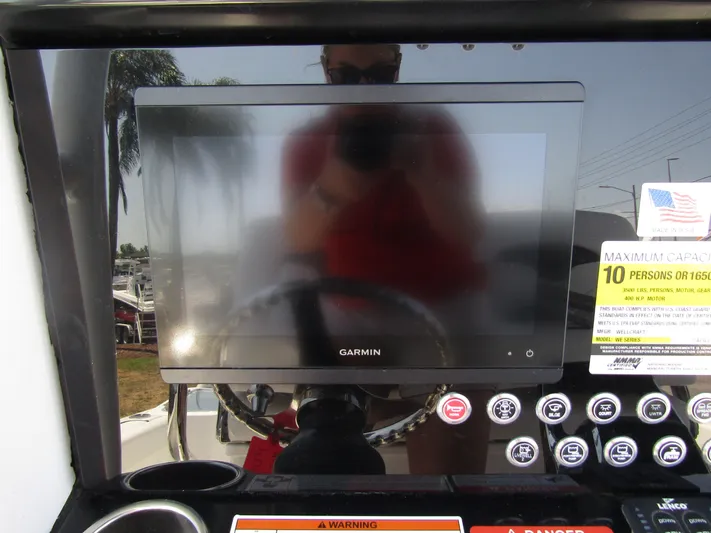  Yacht Photos Pics Garmin display on 2024 Wellcraft 243 Fisherman boat dashboard.