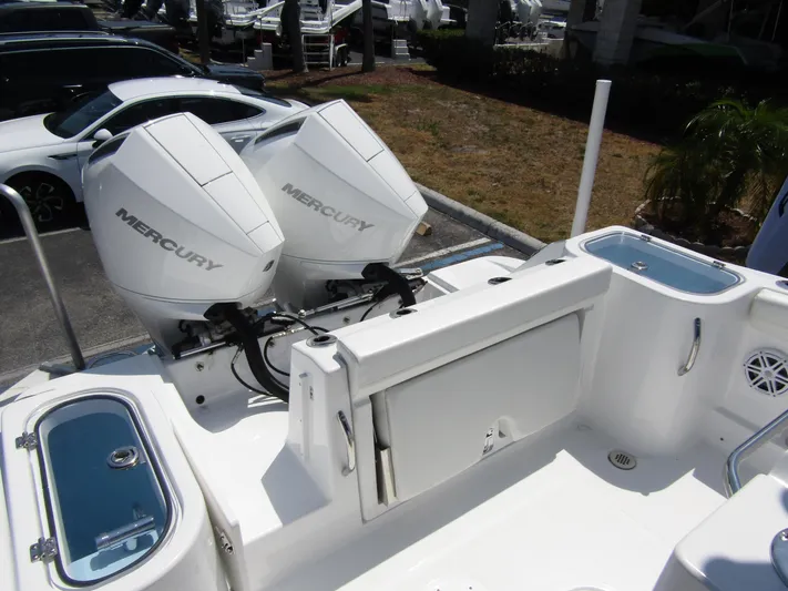  Yacht Photos Pics 2024 Wellcraft 243 Fisherman boat with dual Mercury outboard engines.