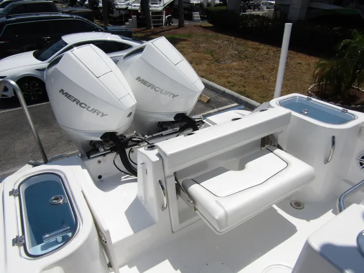  Yacht Photos Pics 2024 Wellcraft 243 Fisherman boat with dual Mercury outboard engines.