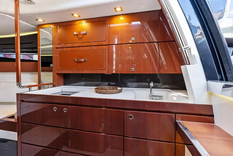 La Ruta Yacht Photos Pics Luxurious wooden cabinetry in the 2017 Riva Rivamare yacht kitchen.