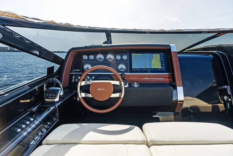 La Ruta Yacht Photos Pics 2017 Riva Rivamare yacht dashboard with steering wheel and navigation system.