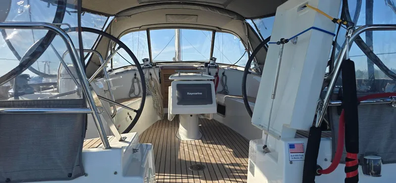 Sognare Yacht Photos Pics 2011 Beneteau Oceanis 40 sailboat cockpit with dual steering wheels and navigation equipment.