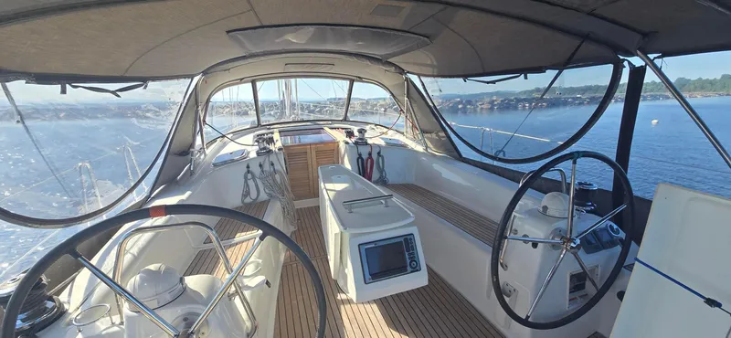 Sognare Yacht Photos Pics Cockpit view of 2011 Beneteau Oceanis 40 sailboat with dual steering wheels.