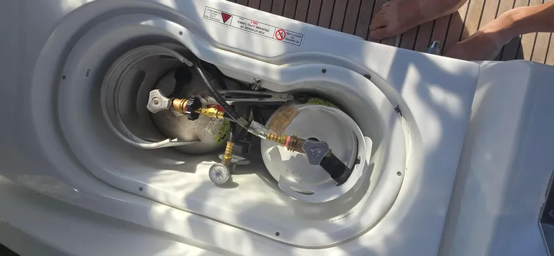 Sognare Yacht Photos Pics Propane tank compartment on a 2011 Beneteau Oceanis 40 sailboat deck.