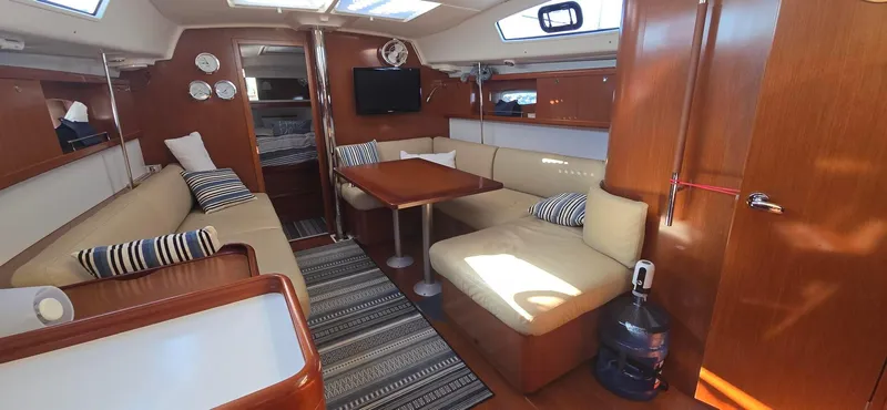 Sognare Yacht Photos Pics Interior of 2011 Beneteau Oceanis 40 yacht with cozy seating and modern amenities.