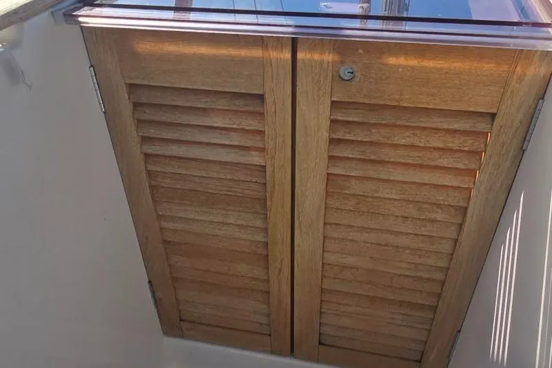 Sognare Yacht Photos Pics Wooden hatch doors on a 2011 Beneteau Oceanis 40 sailboat.