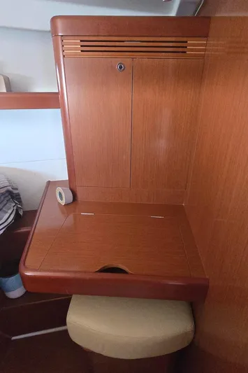 Sognare Yacht Photos Pics Wooden interior desk and chair on a 2011 Beneteau Oceanis 40 sailboat.