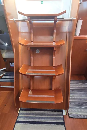 Sognare Yacht Photos Pics Interior wooden stairs of 2011 Beneteau Oceanis 40 yacht, featuring elegant design and craftsmanship.