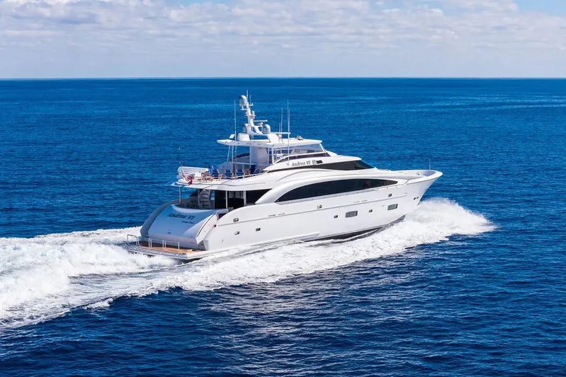  Yacht Photos Pics Luxurious 2014 Horizon RP 110 yacht cruising on open ocean under clear skies.