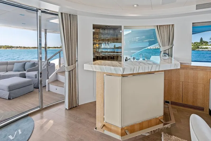  Yacht Photos Pics Luxurious interior of 2014 Horizon RP 110 yacht with elegant bar and ocean view.