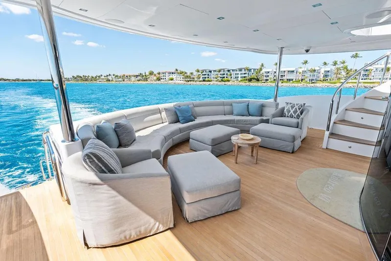  Yacht Photos Pics Luxurious Horizon RP 110 yacht deck with elegant seating, ocean view, and modern design, 2014 model.