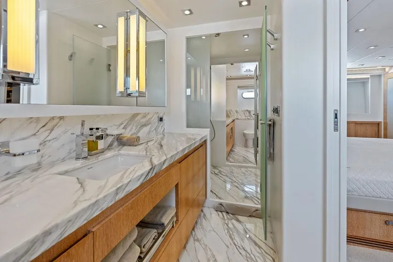  Yacht Photos Pics Luxurious bathroom in 2014 Horizon RP 110 yacht with marble countertops and modern fixtures.