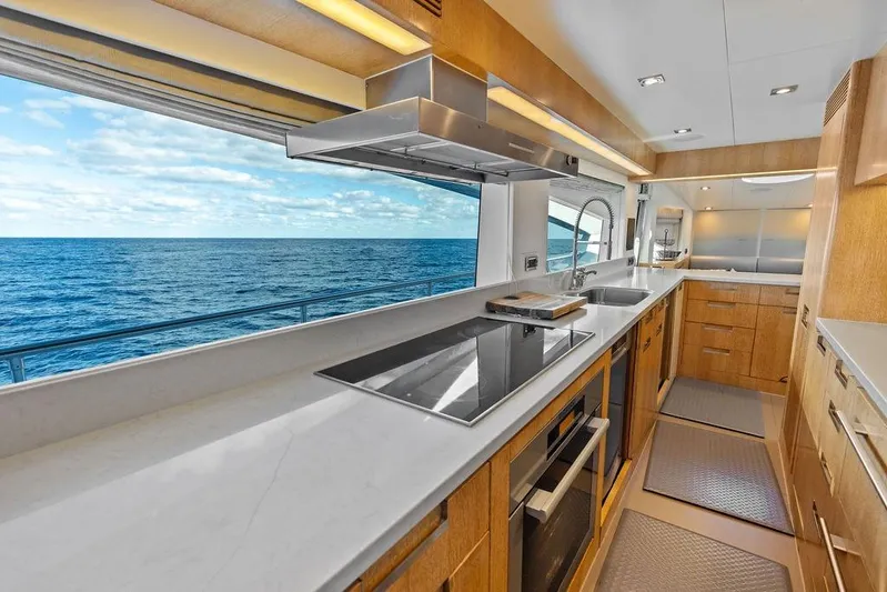  Yacht Photos Pics Luxurious kitchen interior on 2014 Horizon RP 110 yacht with ocean view.