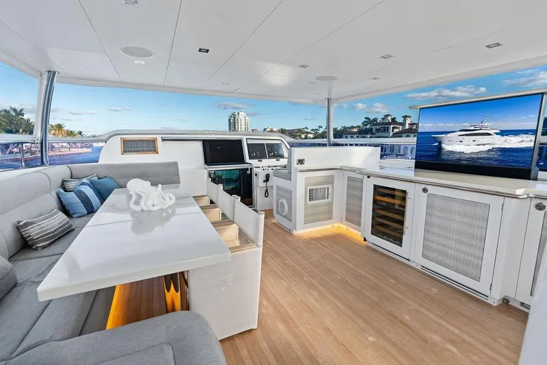  Yacht Photos Pics Luxurious Horizon RP 110 yacht interior with modern seating, TV, and ocean view, 2014 model.