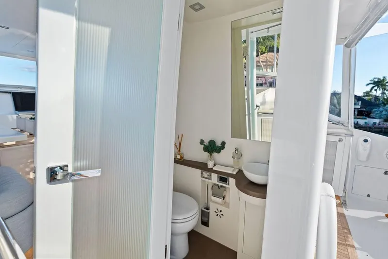  Yacht Photos Pics Luxurious bathroom interior on 2014 Horizon RP 110 yacht, featuring modern fixtures and elegant design.