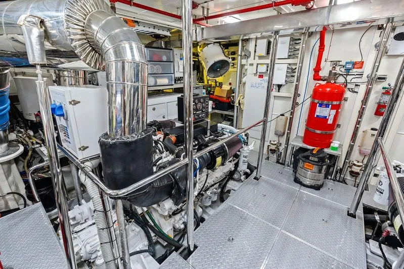  Yacht Photos Pics Engine room of 2014 Horizon RP 110 yacht, featuring advanced machinery and safety equipment.