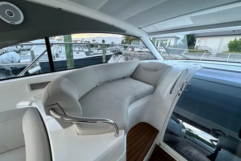 Bejul Yacht Photos Pics Luxurious interior of 2021 Princess V40 yacht with plush seating and sleek design.