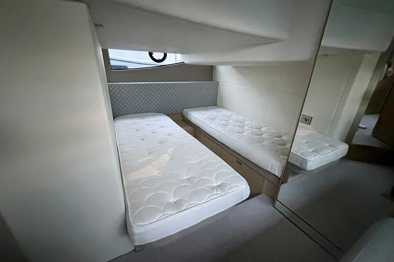 Bejul Yacht Photos Pics Interior of 2021 Princess V40 yacht with twin beds and modern design.
