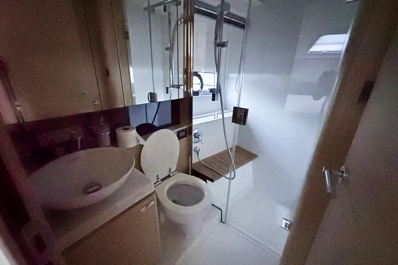 Bejul Yacht Photos Pics Luxurious bathroom in 2021 Princess V40 yacht with modern fixtures and elegant design.