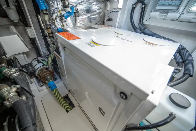 Bejul Yacht Photos Pics Engine room of 2021 Princess V40 yacht with mechanical components and wiring.