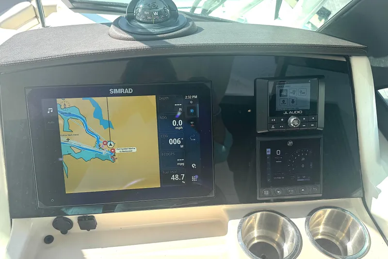 Blue Horizons II Yacht Photos Pics Dashboard of 2023 Boston Whaler 240 Vantage with navigation and audio controls.