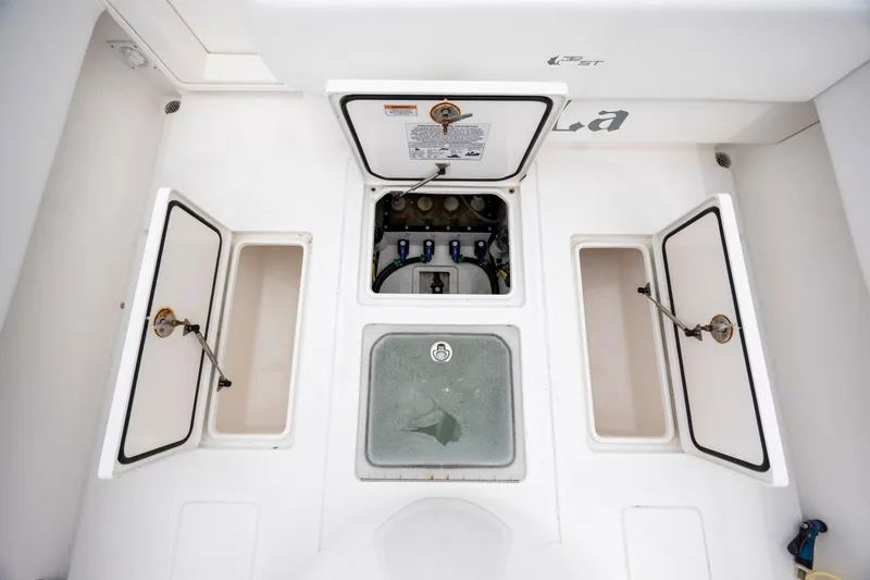  Yacht Photos Pics 2023 Contender 32 ST boat storage compartments and livewell, open for inspection.