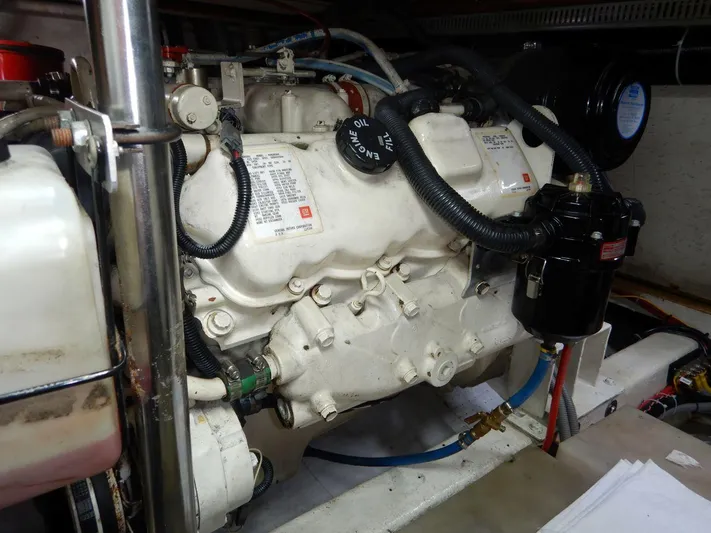  Yacht Photos Pics Engine room of 1990 Ocean Alexander 440 Sundeck CPMY, showcasing detailed mechanical components.