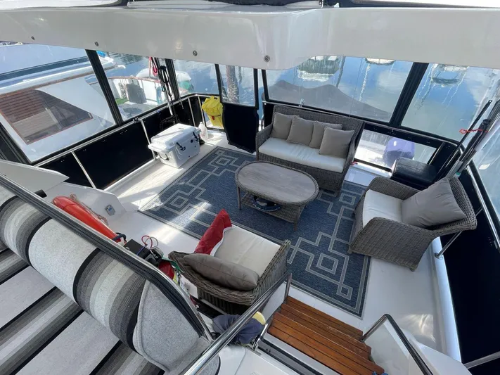  Yacht Photos Pics Luxurious 1990 Ocean Alexander 440 Sundeck CPMY interior with elegant seating and modern decor.