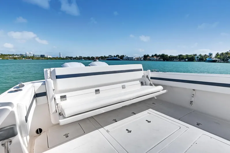 Double Trouble Yacht Photos Pics 2017 Intrepid 327 Center Console boat with spacious seating on calm waters.