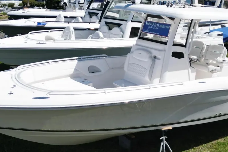 Stamas 31t Yacht Photos Pics 2022 Stamas 31T Aventura boat displayed at a marina, showcasing sleek design and spacious seating.