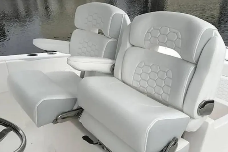 Stamas 31t Yacht Photos Pics 2022 Stamas 31T Aventura boat seats with hexagonal pattern, overlooking water.