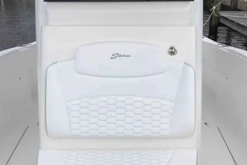 Stamas 31t Yacht Photos Pics 2022 Stamas 31T Aventura boat seat with hexagonal pattern and logo.