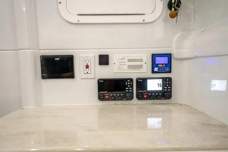  Yacht Photos Pics Control panel of 2025 Yellowfin 42 Offshore boat with electronic displays and switches.