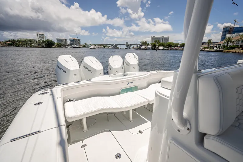  Yacht Photos Pics 2025 Yellowfin 42 Offshore boat with four Mercury engines on a sunny day.