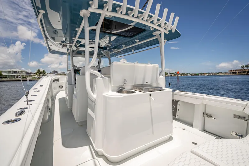  Yacht Photos Pics 2025 Yellowfin 42 Offshore boat with sleek design, spacious deck, and modern amenities.
