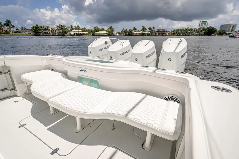  Yacht Photos Pics 2025 Yellowfin 42 Offshore boat with luxurious seating and powerful Mercury engines.