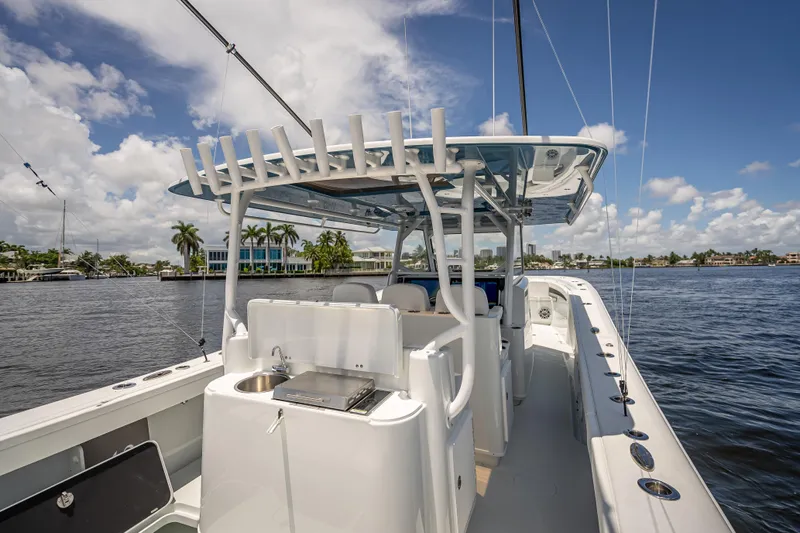  Yacht Photos Pics 2025 Yellowfin 42 Offshore boat on a sunny day, featuring sleek design and modern amenities.