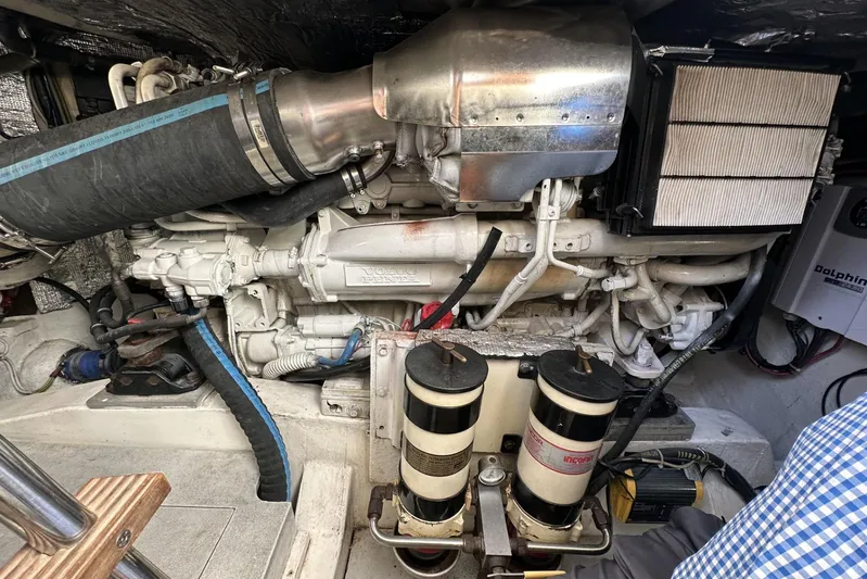 Pallavisino Yacht Photos Pics Engine compartment of 2007 Mochi Craft 44 Dolphin yacht, featuring Volvo Penta components.