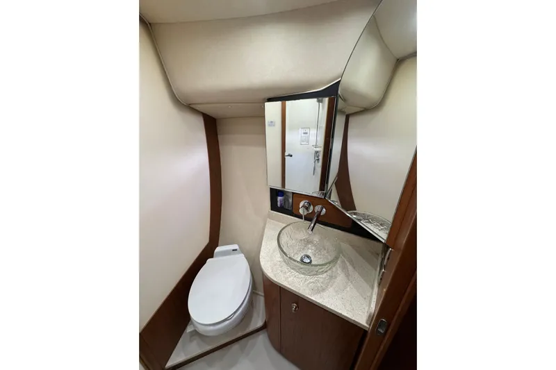  Yacht Photos Pics Luxurious bathroom in 2007 Tiara 43 yacht with modern fixtures and elegant design.