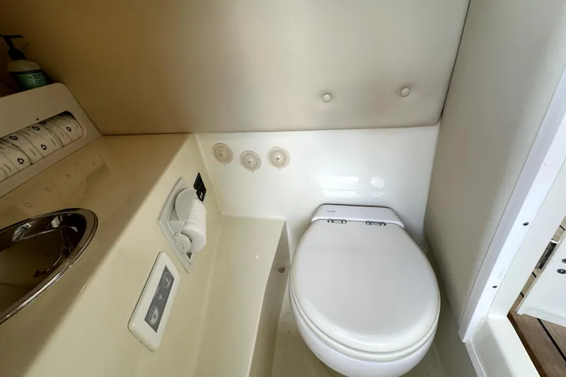  Yacht Photos Pics 2019 Chris-Craft Launch 30 boat bathroom with toilet and sink.