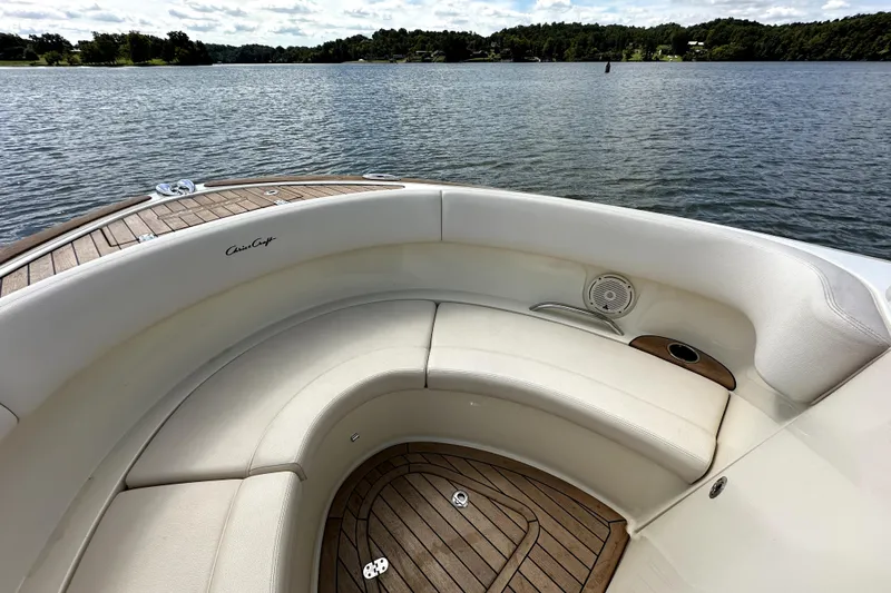  Yacht Photos Pics 2019 Chris-Craft Launch 30 boat interior with elegant seating and scenic lake view.