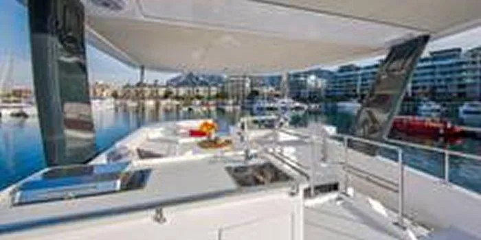 Rockin U Yacht Photos Pics Leopard 43 Powercat 2020 yacht interior with marina view, featuring modern amenities and sleek design.