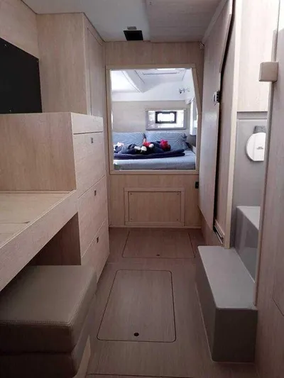 Rockin U Yacht Photos Pics Interior of 2020 Leopard 43 Powercat with modern furnishings and cozy sleeping area.