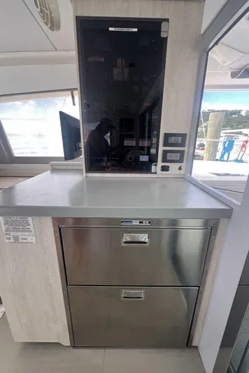 Rockin U Yacht Photos Pics Interior of a 2020 Leopard 43 Powercat featuring a modern kitchen with stainless steel drawers.