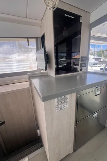 Rockin U Yacht Photos Pics 2020 Leopard 43 Powercat interior with modern kitchen appliances and sleek design.