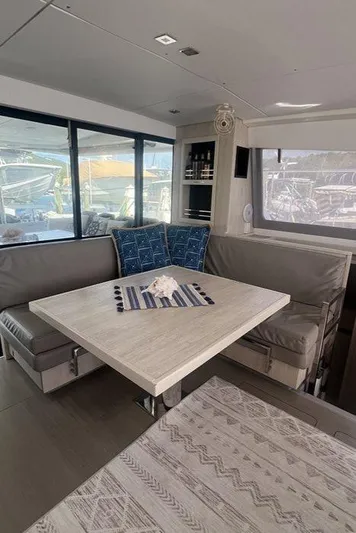 Rockin U Yacht Photos Pics Interior of 2020 Leopard 43 Powercat with modern dining area and large windows.